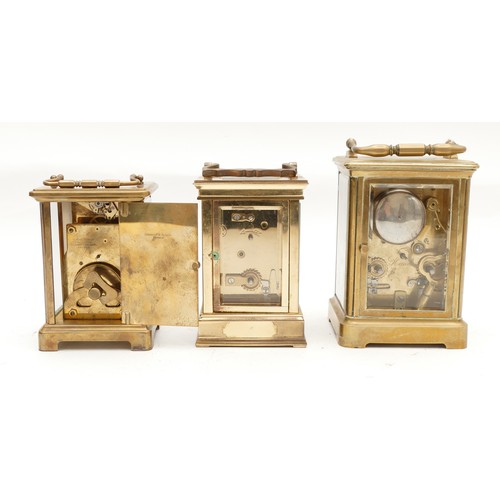 706 - Three early to mid twentieth century brass carriage clocks, housing 8 day movements, two examples co... 