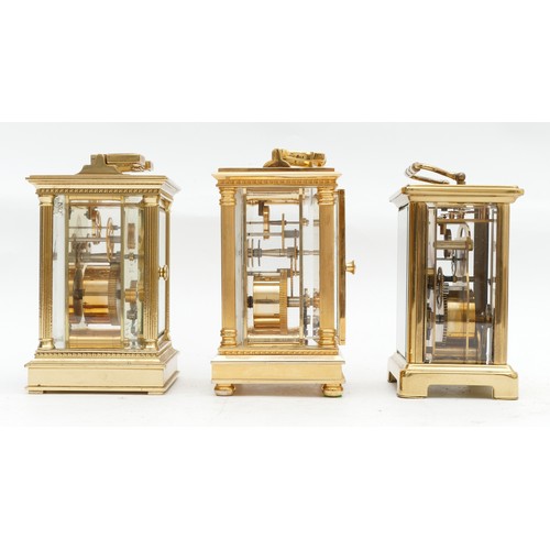 709 - Three mid to late twentieth century brass carriage clocks, to include, a JW Benson example, with a F... 