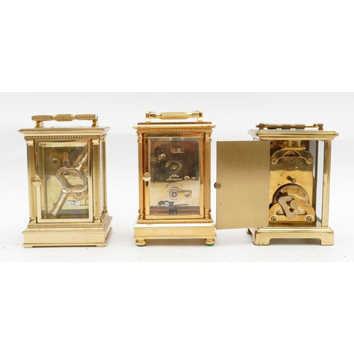 709 - Three mid to late twentieth century brass carriage clocks, to include, a JW Benson example, with a F... 