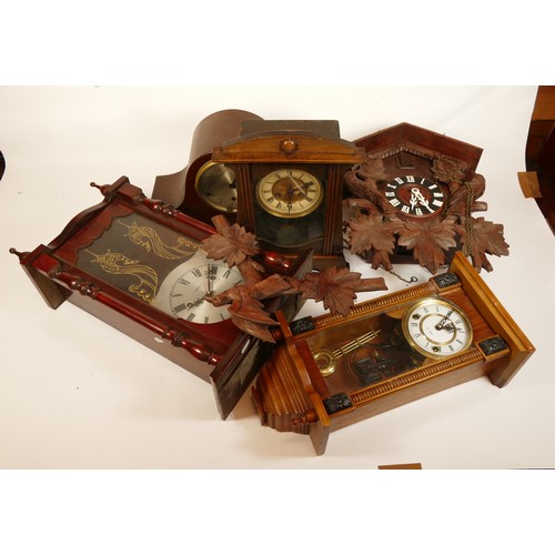 711 - A collection of mid-twentieth century Black Forest cuckoo clocks, having single and twin train manua... 