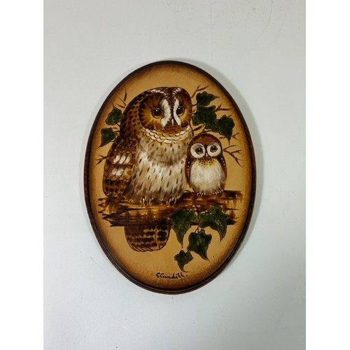 718 - George Cundill (1945-2013); Two Pokerwork oval plaques, one depicting two owls and the other a squat... 