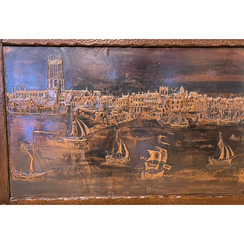 725 - A 20th century large copper wall plaque, embossed and planished depicting in detail harbour scene wi... 