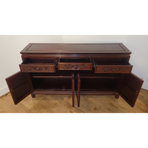 733 - Oriental hardwood sideboard, rectangular top with rounded edges, fitted with three frieze drawers ha... 