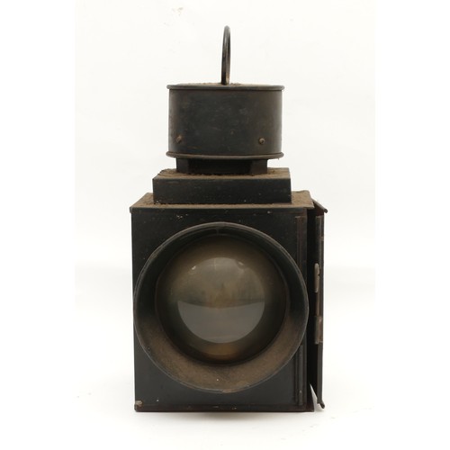 53 - An unmarked railroad LMS style signal lamp with top carry handle and circular convex glass, complete... 