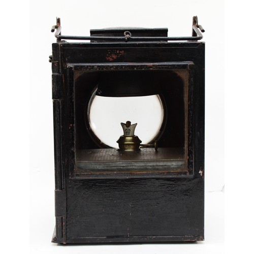 55 - A large L.M.S signal/points lamp, complete with burner, both the case and the burner are stamped L.M... 