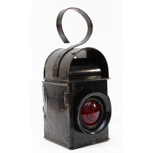 56 - An unmarked road/railway lamp with three red windows, complete with burner.