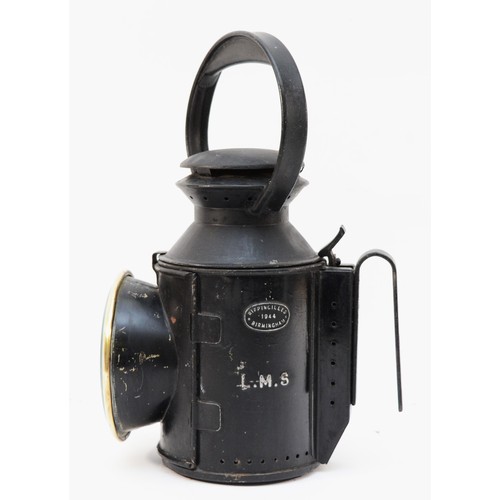 57 - An L.M.S. three-aspect handlamp with maker's badge 'Rippingilles 1944', complete with burner, and st... 