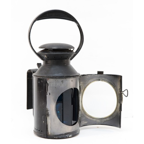 57 - An L.M.S. three-aspect handlamp with maker's badge 'Rippingilles 1944', complete with burner, and st... 