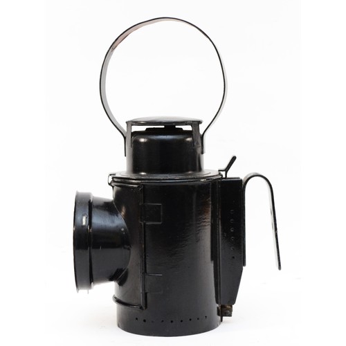 58 - An unmarked L.M.S. style three-aspect handlamp, stamped D2181.