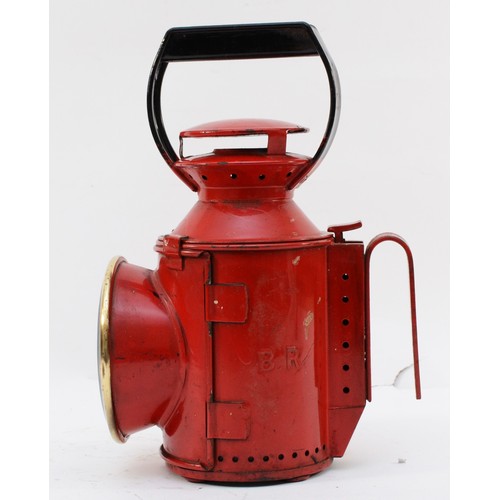 63 - A red B.R. three-aspect handlamp, complete with burner.