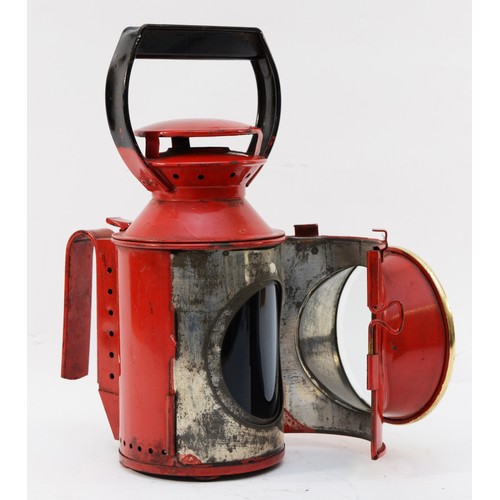 63 - A red B.R. three-aspect handlamp, complete with burner.