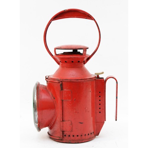 70 - A red London Transport (L.T) three-aspect handlamp, complete with burner.