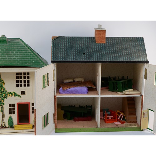 144 - Two 1960s dolls houses, of wood and metal construction with contents including furniture and accesso... 