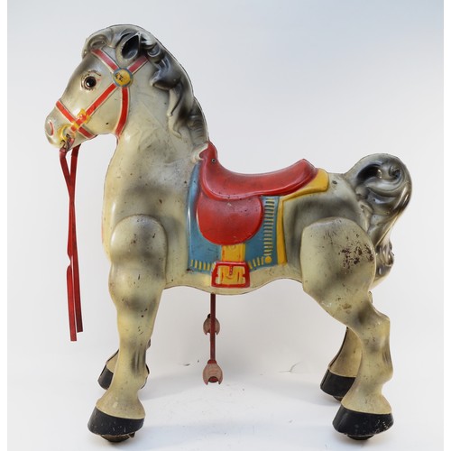 147 - A 1950s Mobo pedal horse, in pressed steel, together with a Kelo pogo stick. (2)