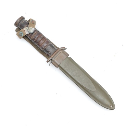 366 - A WWII era US M3-Utica dagger, by B.M & Co and complete with the M8 scabbard, signed Eugene Levine 3... 