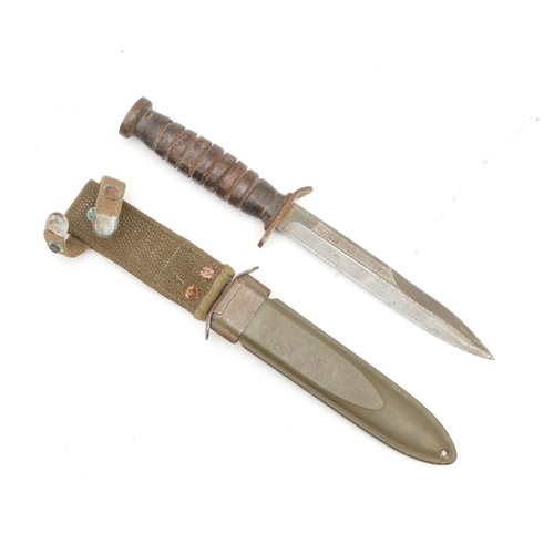 366 - A WWII era US M3-Utica dagger, by B.M & Co and complete with the M8 scabbard, signed Eugene Levine 3... 