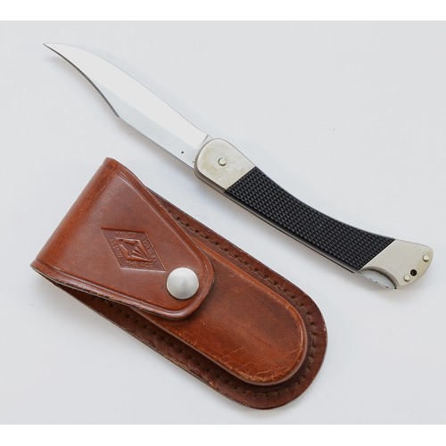 368 - A Puma 270 stainless German flip knife, with leather case, 10cm.
This bladed product is not for sale... 