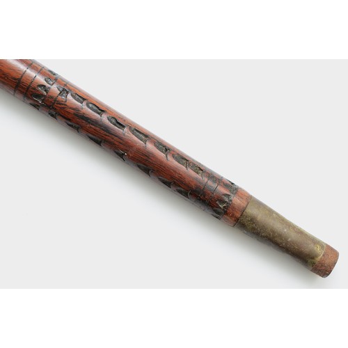 379 - An early-twentieth century Indian swordstick, hardwood with an inlaid bone accent, 91cm.
This bladed... 