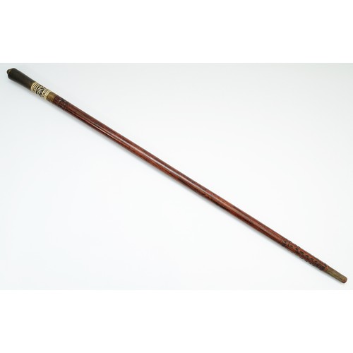 379 - An early-twentieth century Indian swordstick, hardwood with an inlaid bone accent, 91cm.
This bladed... 