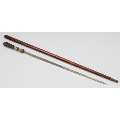 379 - An early-twentieth century Indian swordstick, hardwood with an inlaid bone accent, 91cm.
This bladed... 