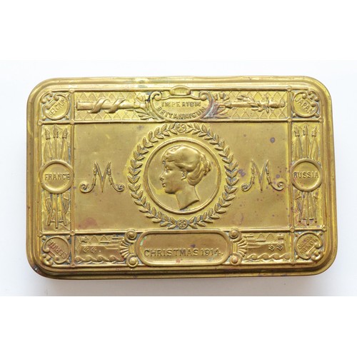 401 - A WWI brass Queen Mary 1914 Christmas tin, 13
x 8.5cm.