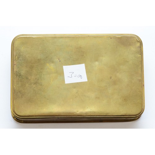 401 - A WWI brass Queen Mary 1914 Christmas tin, 13
x 8.5cm.