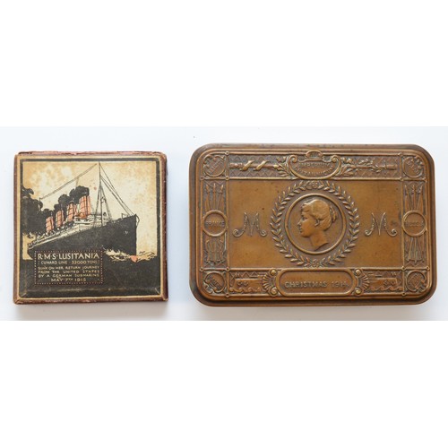 403 - A WWI brass Queen Mary 1914 Christmas tin, 13 x 8.5cm, together with a Replica Lusitania Medal, in o... 