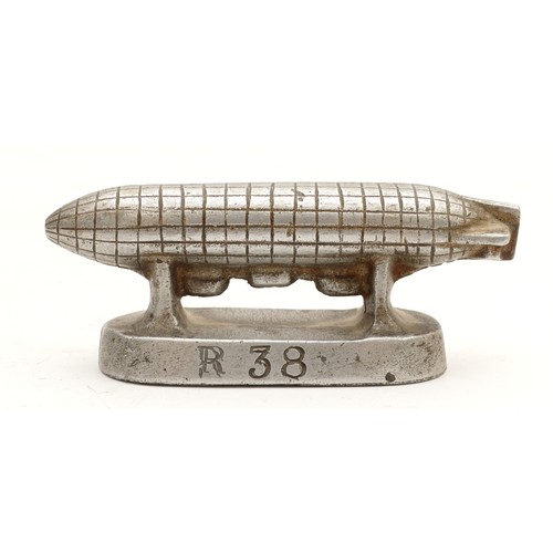 408 - R38/ZR2, an alloy model of the airship, 12.5 x 5cm.
The R38 (also known as ZR2) was the lead ship in... 