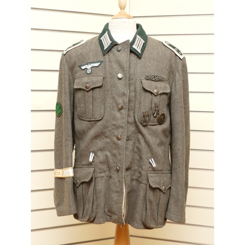 415 - WWII German Third Reich M42 Army (Heer) Field Blouse, With various badges attached, to include the C... 