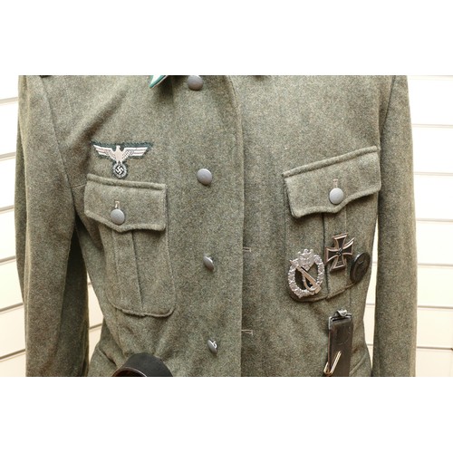 416 - WWII German Third Reich M36 Field Jacket, to include the Edelweiss insignia, eagle with swastika, re... 