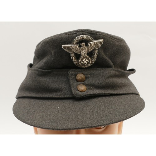 431 - WWII German Third Reich M43 Police cap, embroidered with the eagle and swastika, presuming belonged ... 