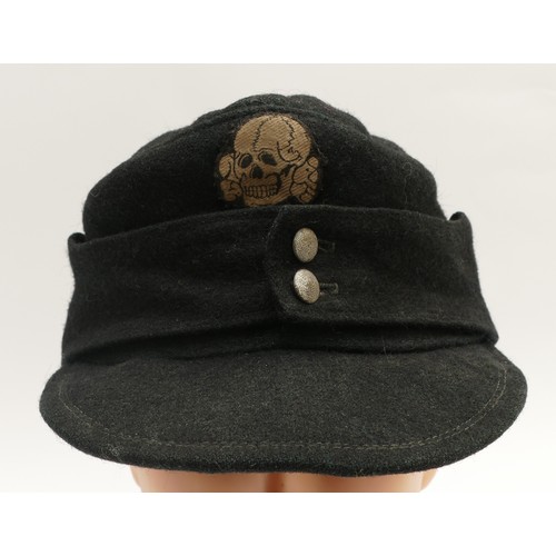 432 - A WWII German Third Reich Waffen-SS Cap, embroidered with the BeVo SS eagle with swastika as well as... 