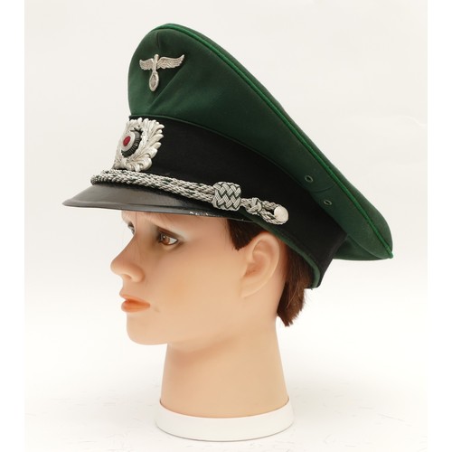 435 - WWII German Third Reich Officers green visor cap, embroidered with the eagle, swastika removed and w... 