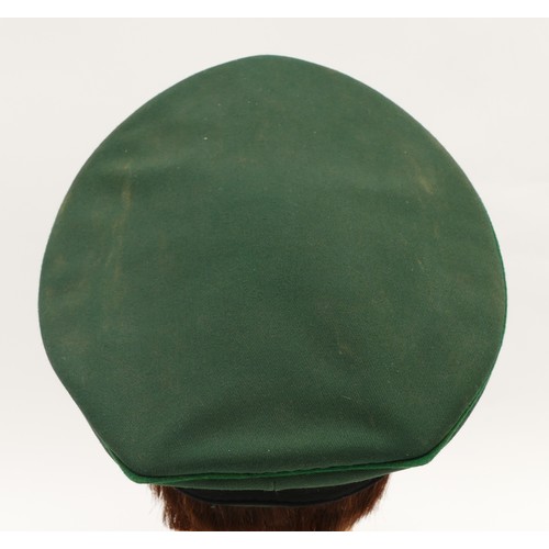 435 - WWII German Third Reich Officers green visor cap, embroidered with the eagle, swastika removed and w... 