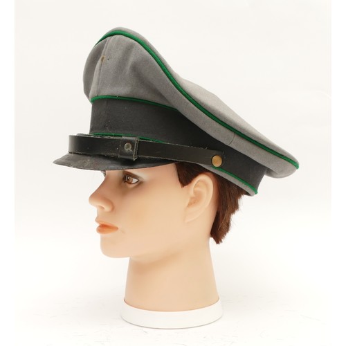 437 - WWII German Third Reich visor cap, manufactured by Alkero A. Kempf, missing insignia of the eagle an... 