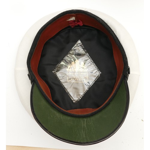 438 - ERII Royal Navy visor cap, manufactured by Paisley's Limited, interior roam leather and behind the q... 