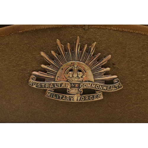 439 - An Australian Slouch hat, embroidered with the Kings Australian Commonwealth Military Forces badge.
... 