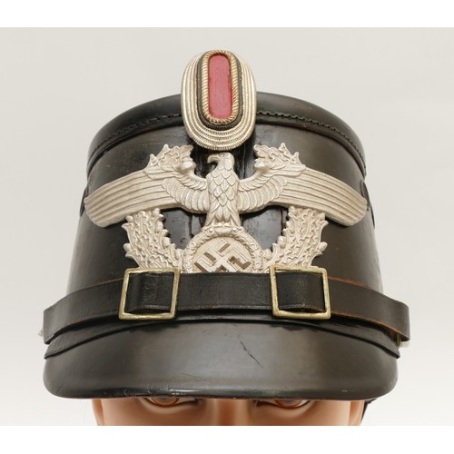 450 - WWII German Third Reich Police Shako helmet, embroidered the eagle with swastika on the front, inter... 