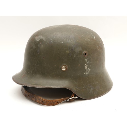 454 - WWII German M42 helmet, insignia decal of the Third Reich flag on the side, interior stamped NSH6, H... 