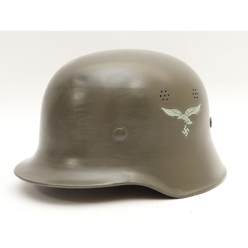 455 - WWII later reproduction German M42 helmet, double decal of the Luftwaffe Eagle as well as the German... 