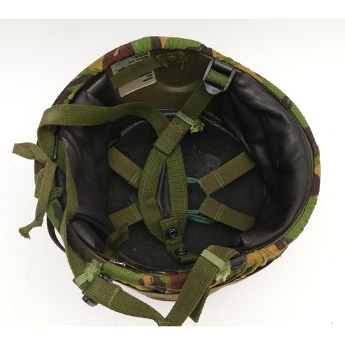 463 - A NATO stock combat helmet, GS Mk 6 1988/90, size medium, by N.P. Coventry, with camouflage cover