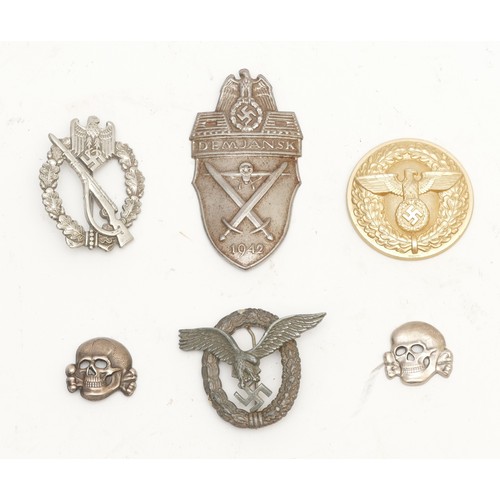 474 - WWII Six German badges to include the NSDAP belt buckle, marked RZM M4/116, Luftwaffe reproduction O... 