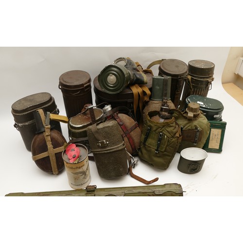 506 - WWII collection of canteens, gas mask containers and more.