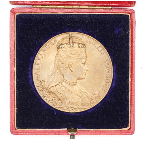 542 - Edward VII, Coronation, 1902, a bronze medal by G.W. de Saulles, also featuring Alexandra, in origin... 