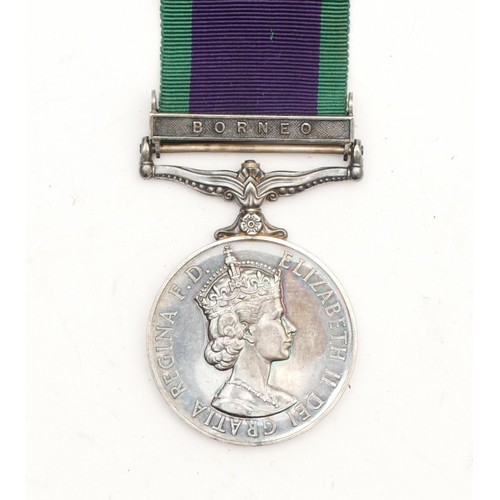 553 - An ERII Borneo Service medal, awarded to 24007396 PTE. H. G. Meechan. ACC.