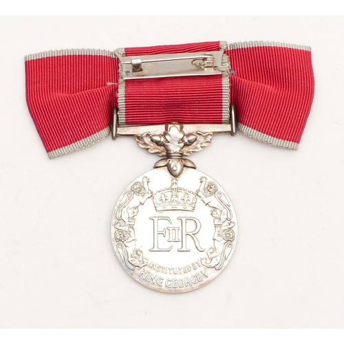 563 - ERII British Empire Medal, presented to Miss Iris Violet Dorothy Rogers, together with the original ... 