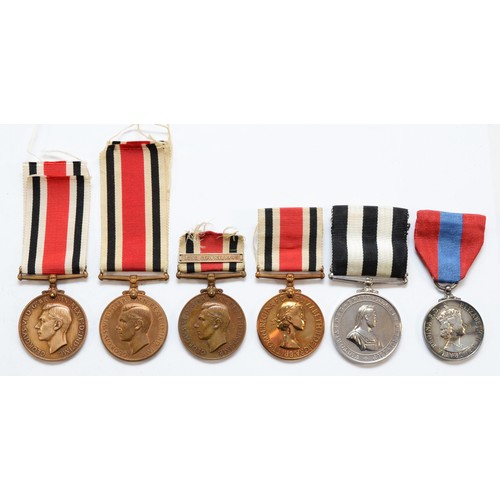 581 - A George VI-ERII medal group, including three Special Constabulary with one clasped Long Service 194... 