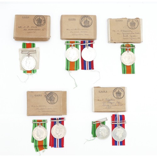 593 - WWII 5x original boxed War and Defence medals.