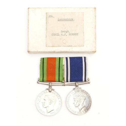 597 - WWII George VI Long Service Lancashire Police and Defence medal, awarded to SERGT. Cyril. A. J. Horn... 