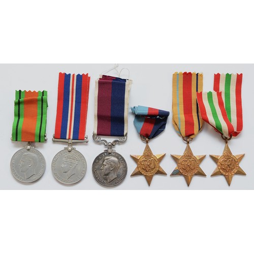 610 - WWII R.A.F long service group, to include the 1939-1945 Star, Africa, Italy, Defence R.A.F Long Serv... 